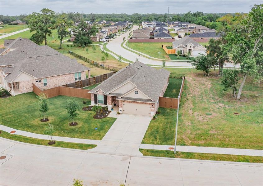 this aerial view shows you the privacy this home has, you have a huge front yard, great landscaping
