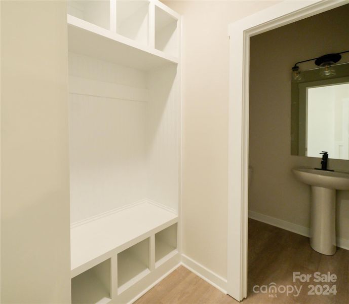 Drop Zone in Mud Room- powder bath tucked away