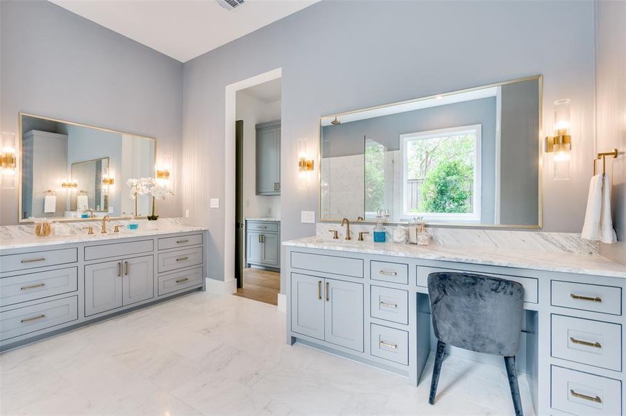 Bathroom featuring vanity and tile patterned flooring