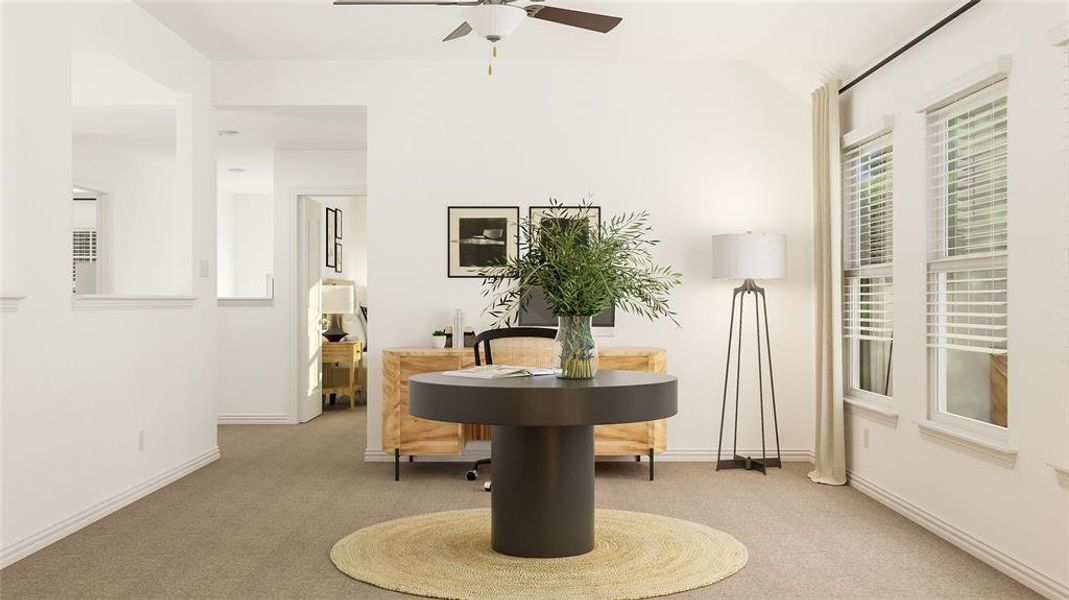 Sitting room featuring lofted ceiling, carpet, and ceiling fan