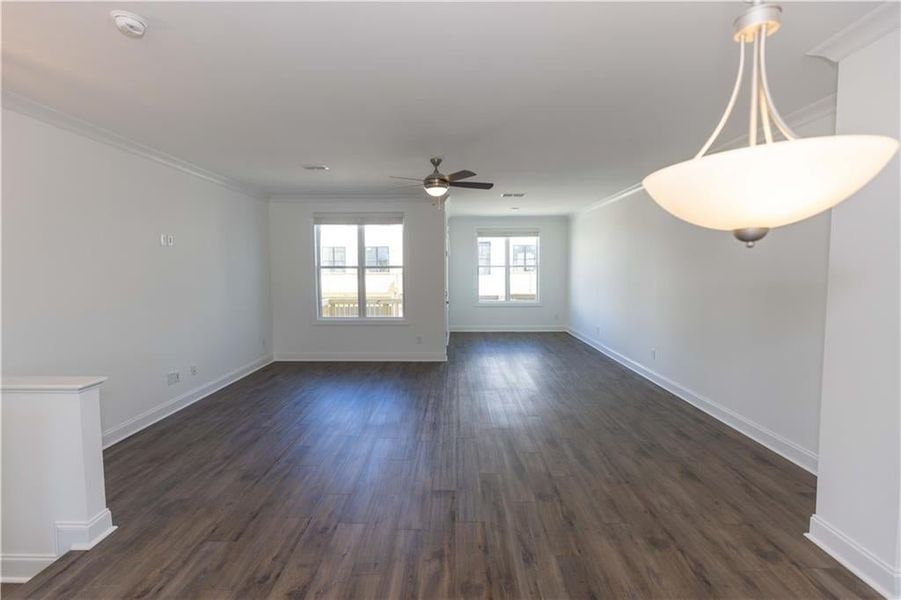 The dining area opens into the family room. **Photo not of actual home, for representation purposes only. **