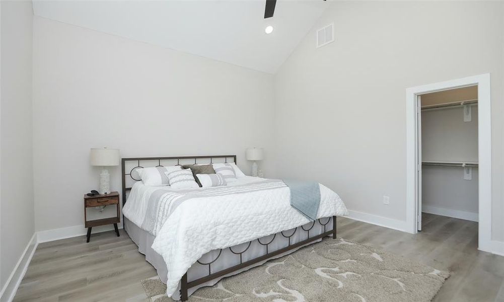 Primary suite has TWO walk in closets, ceiling fan, and fabulous private bathroom!