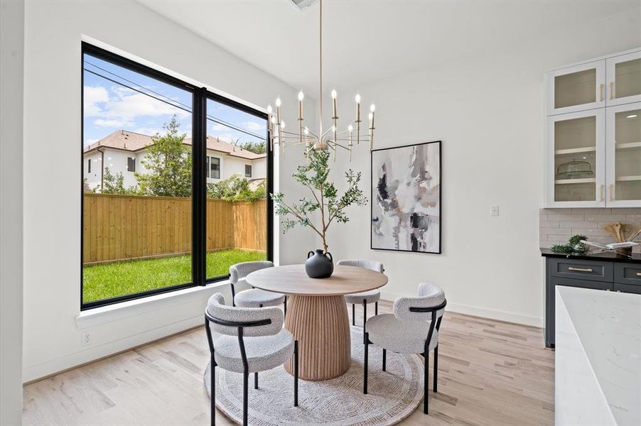 Breakfast room for informal meals and backyard views.