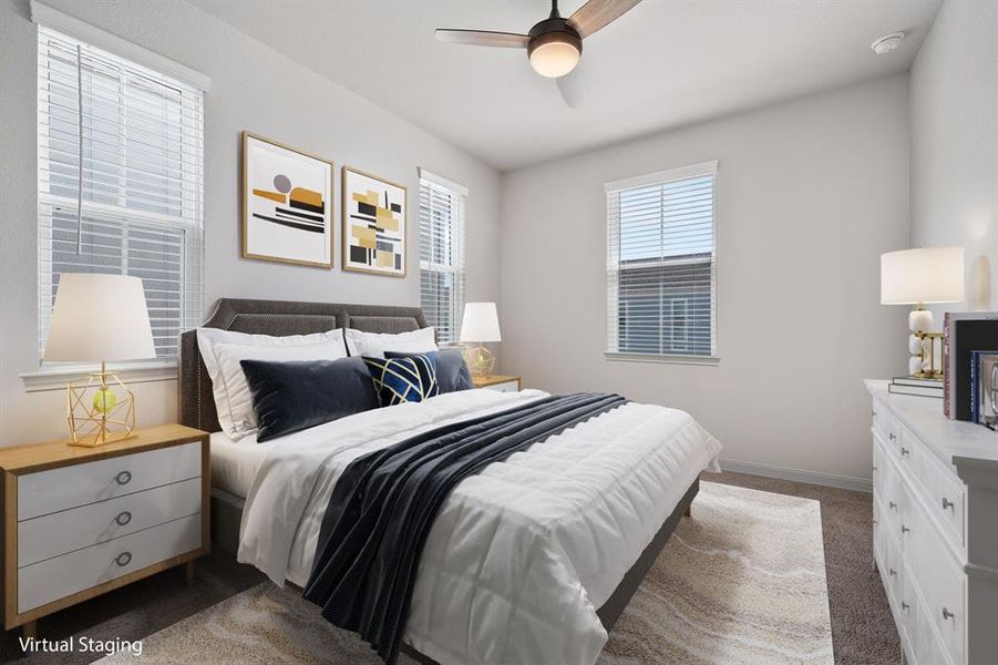 Secondary bedroom features plush carpet, neutral paint, and large windows with privacy blinds.