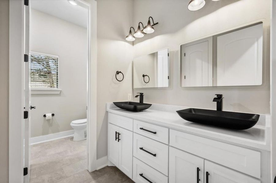 Bathroom with toilet and vanity