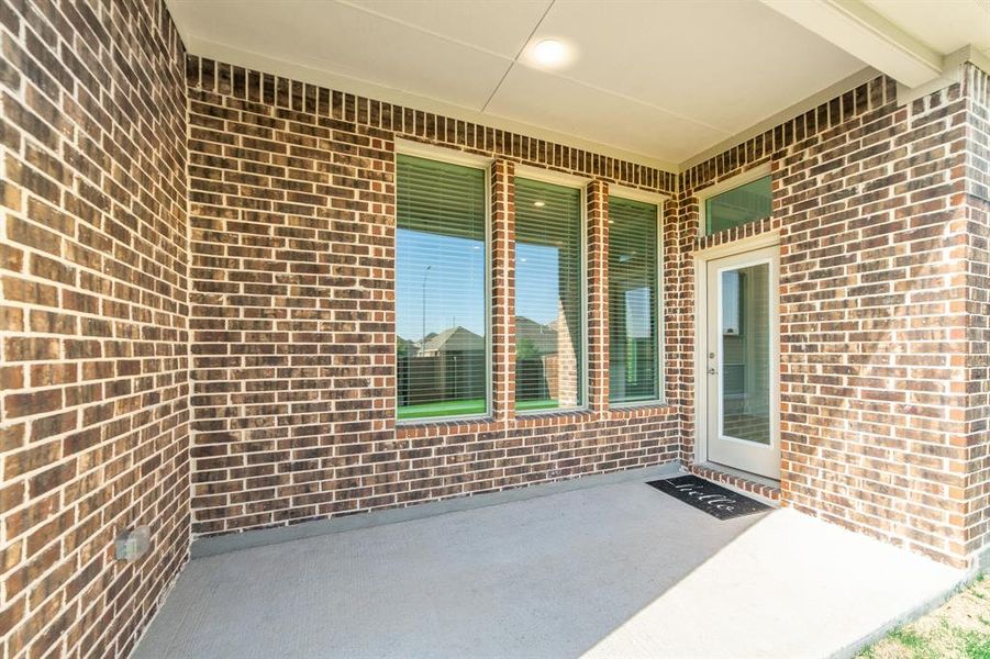 Entrance to property featuring a patio area