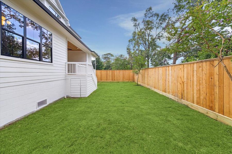 The expansive flat lawn offers endless possibilities for recreation, whether it's for a future sports court or planning for a future pool. Alternatively, it provides ample space for gatherings and leisure activities, making it perfect for enjoying outdoor entertainment and relaxation!