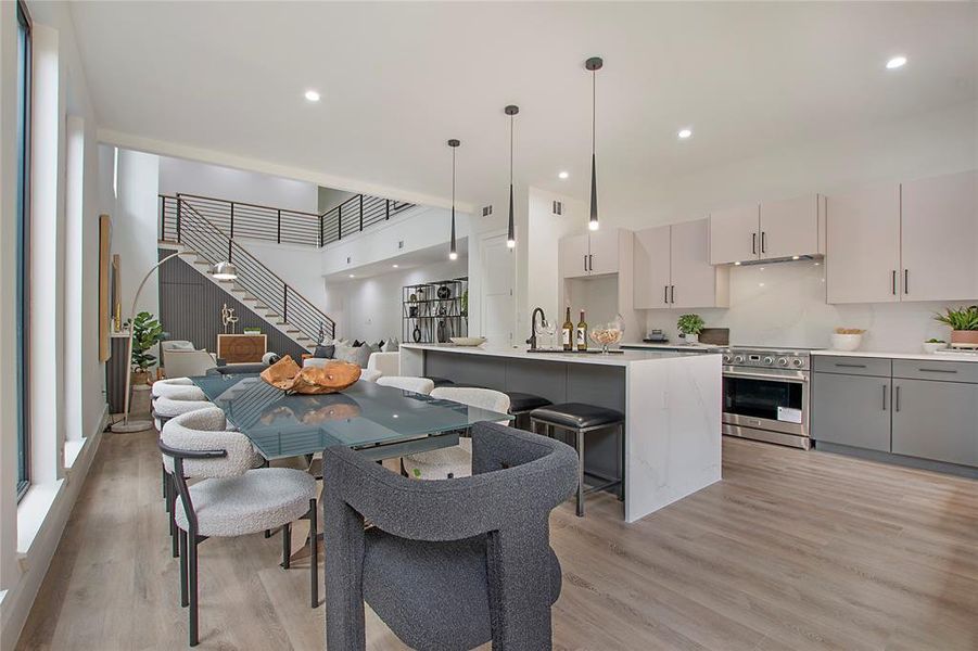 Dining area with light hardwood / wood-style floors