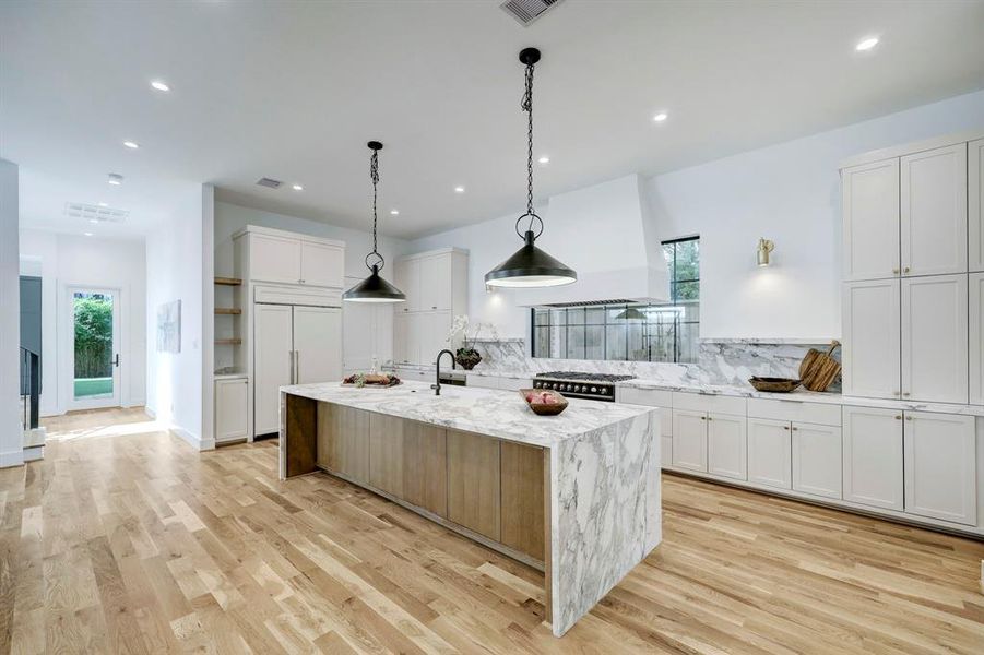 Expansive kitchen including La Cornue gourmet gas range, Wolf/Sub Zero appliances, coffee bar & large pantry