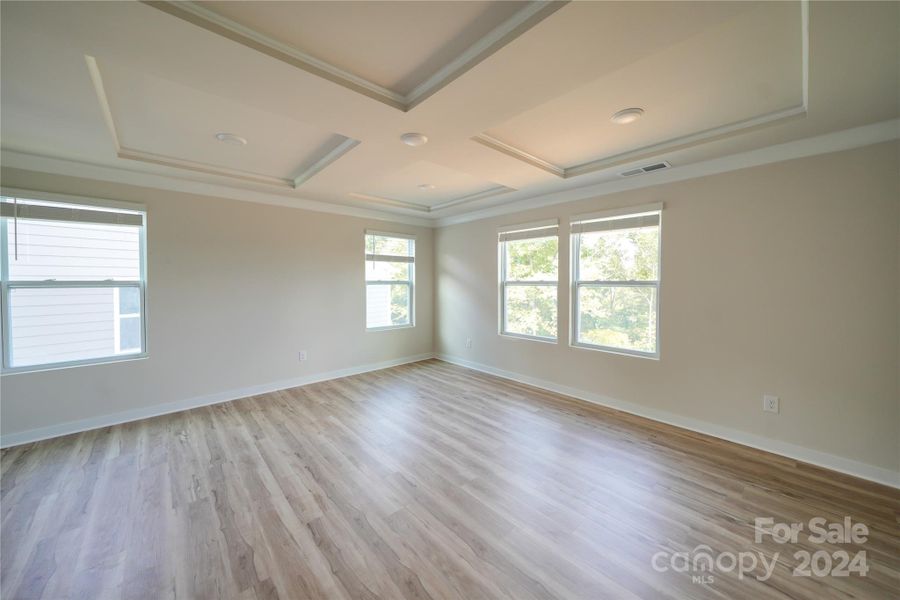 Primary Bedroom with extensive trim detail.