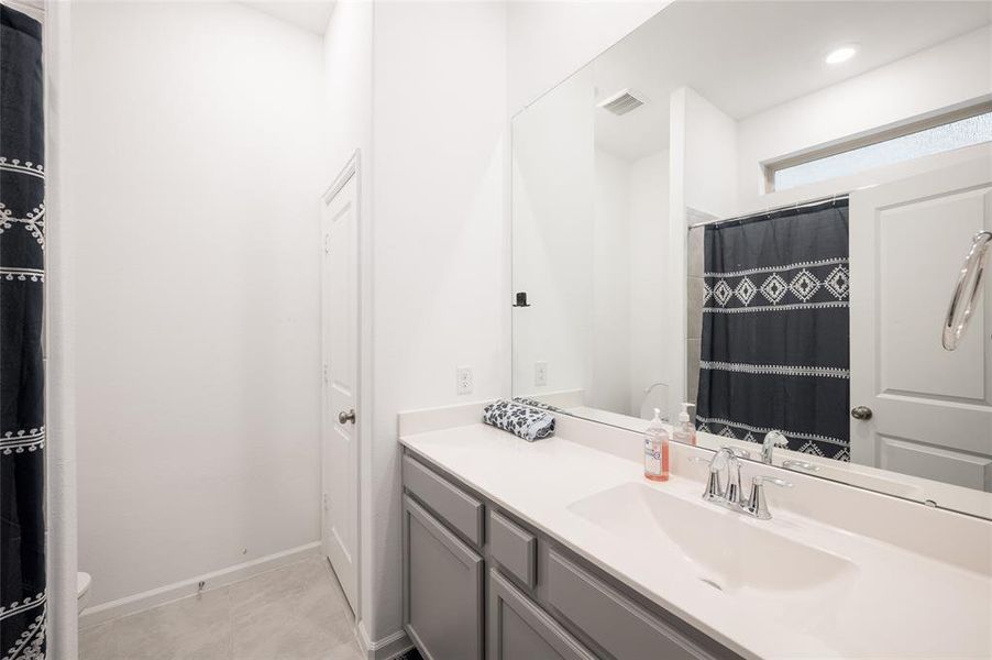 Exclusive access to this 3rd bathroom, designed for the comfort and convenience of the 4th bedroom's occupants