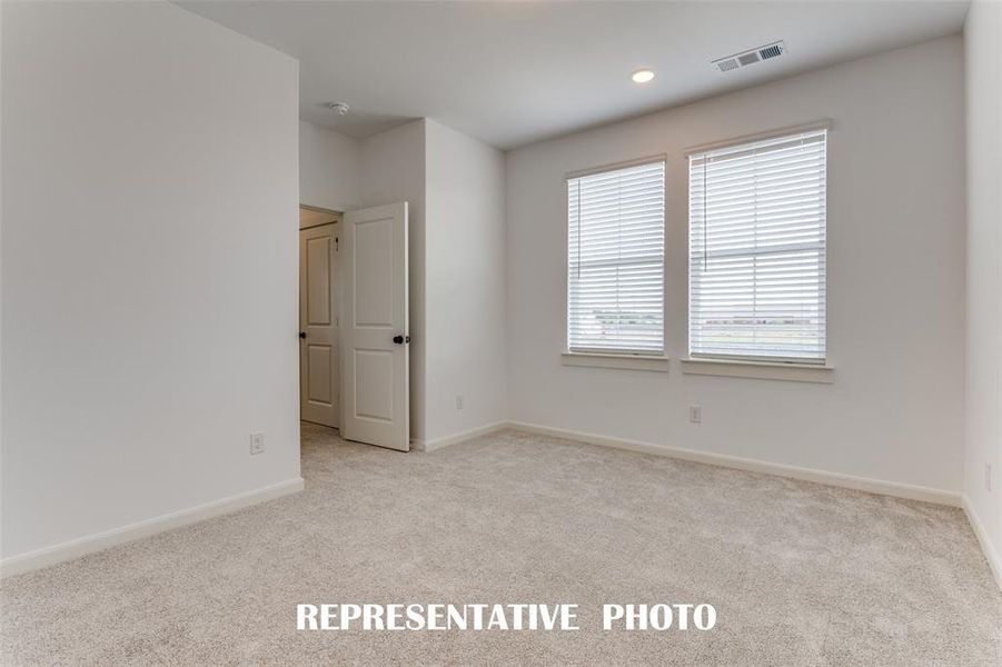 You'll find nicely sized secondary bedrooms in our Brice floor plan.  REPRESENTATIVE PHOTO.