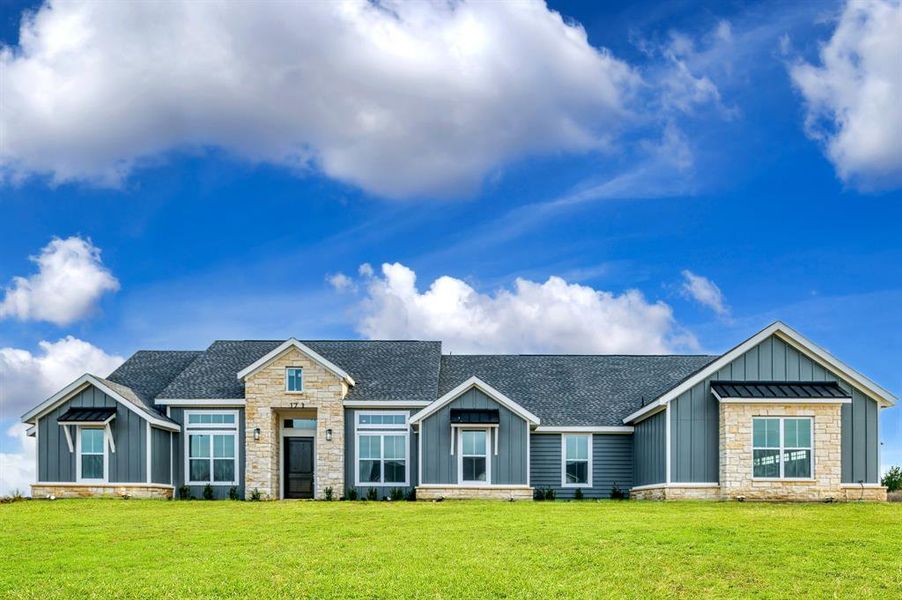 View of front of home with a front lawn