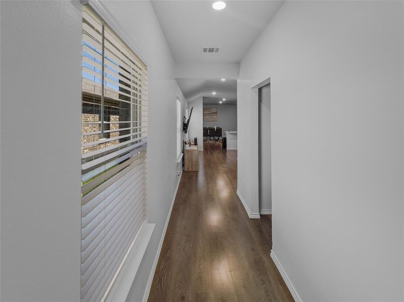 Corridor with dark wood-type flooring