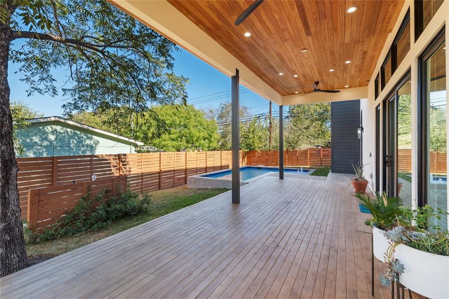 Back deck perfect for outdoor living and entertaining. Covered for year-round enjoyment.