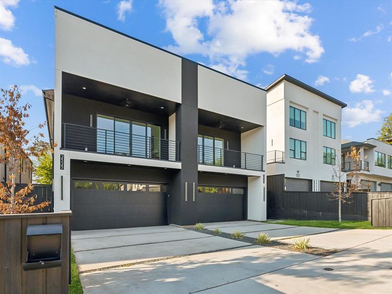 Contemporary house with a balcony and a garage