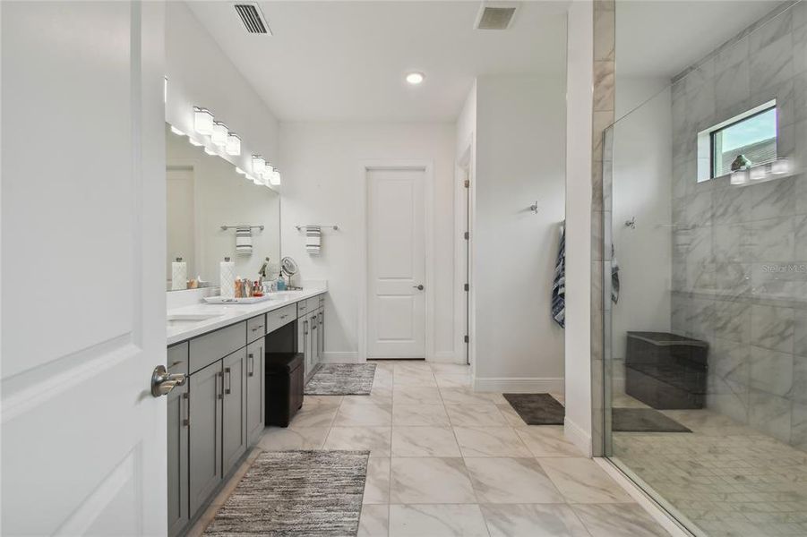 Primary bath with large walk-in shower