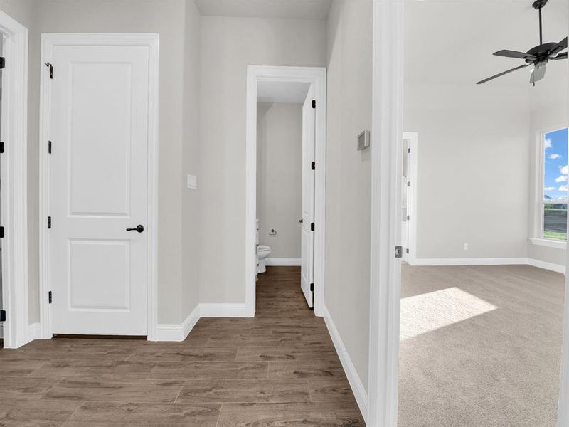 Hallway featuring hardwood / wood-style flooring