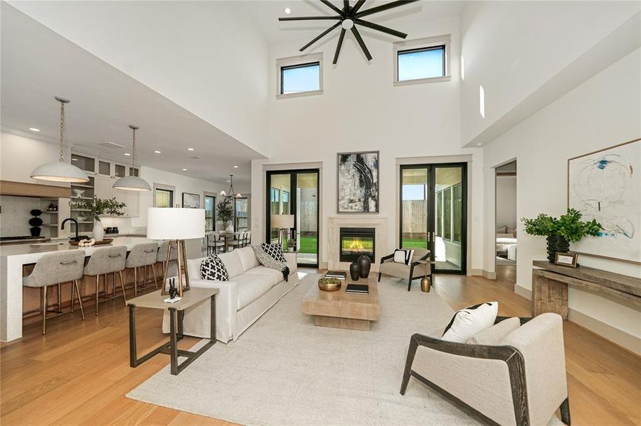 20FT ceilings in the living room with 2 sets of French doors leading to back patio.