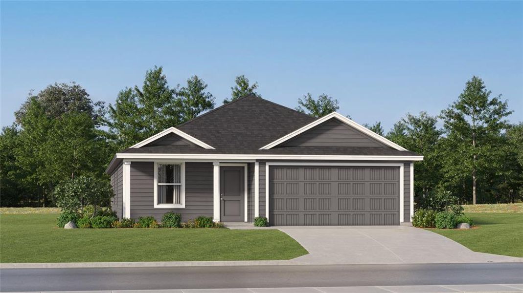 Ranch-style house featuring a garage and a front lawn