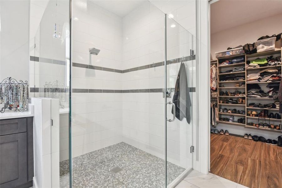 Primary Walk-in Shower and Connecting Closet