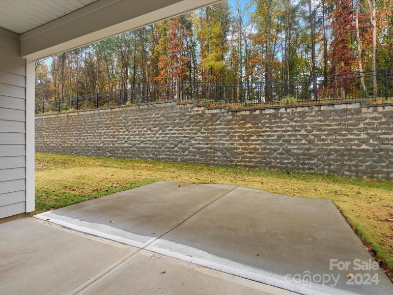 covered back deck with concrete extension