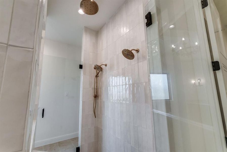 Bathroom with tiled shower