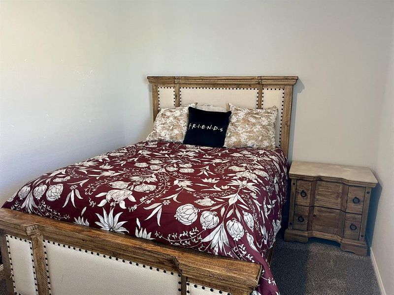 Bedroom featuring carpet floors