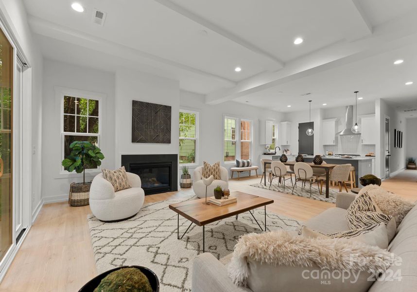 Living room with gas fireplace and gorgeous ceiling detail