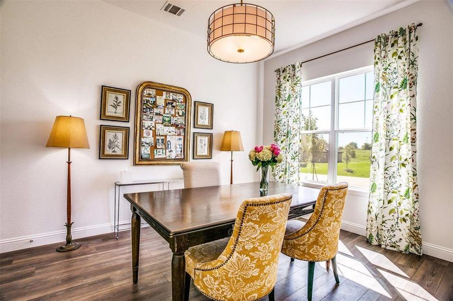 Dining space featuring dark hardwood / wood-style floors