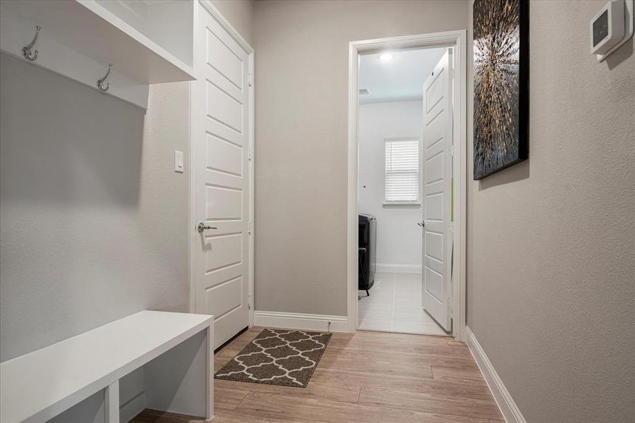 Mudroom featuring light hardwood / wood-style floors