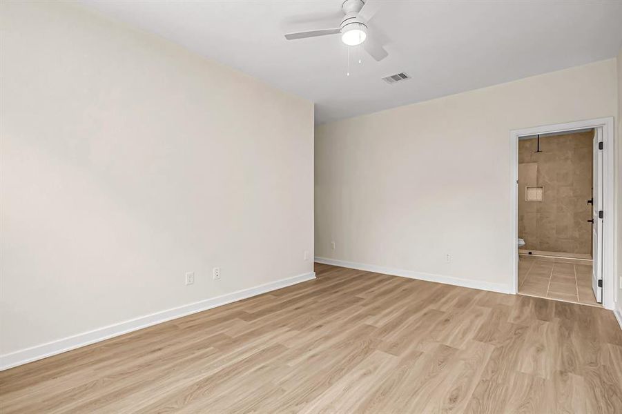 Primary bedroom with ensuite bath.