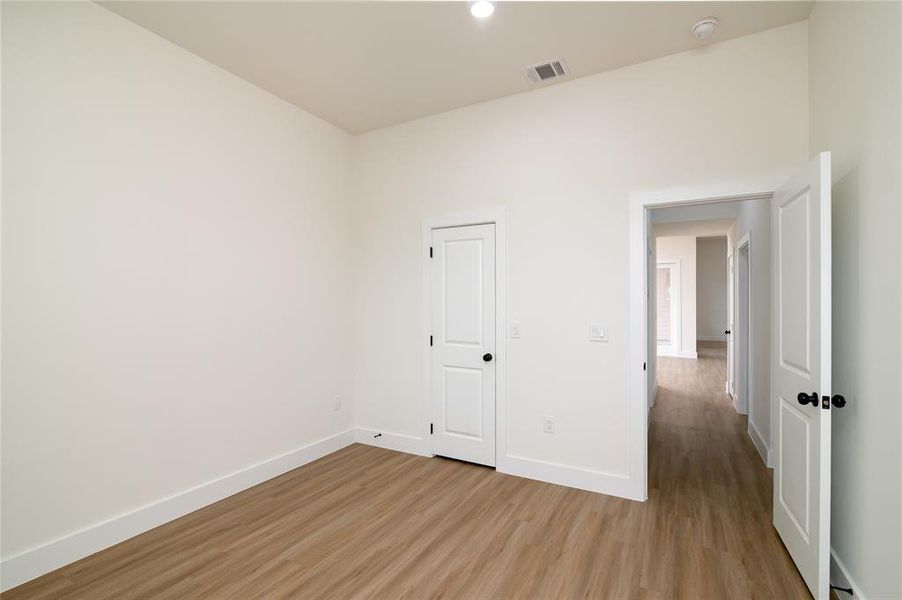 Unfurnished room featuring light hardwood / wood-style flooring