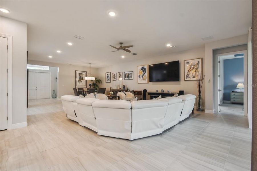 Currently used as a family room/dining room combination, this open floorplan is an extremely flexible / changeable living space.