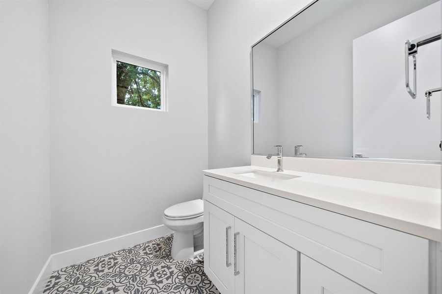 The 2nd floor powder room. The window faces the back of the property.