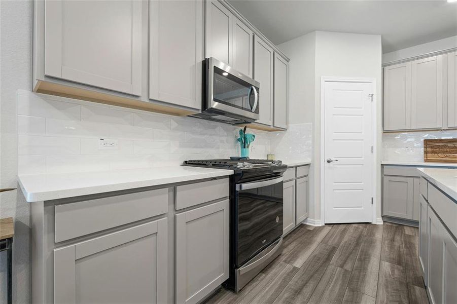 Walk-in Pantry and Plenty of Cabinet/Counter Space.