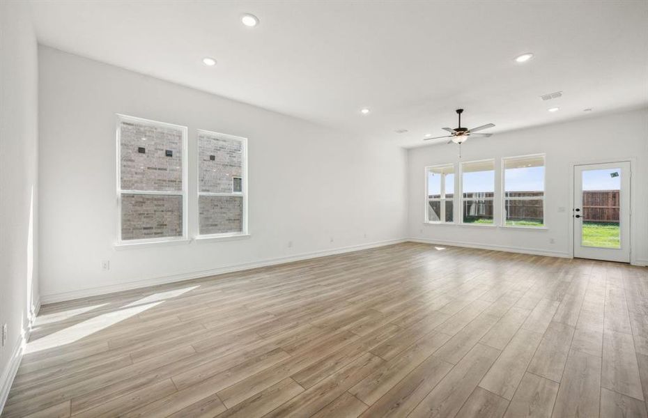 Airy gathering room with large windows*real home pictured