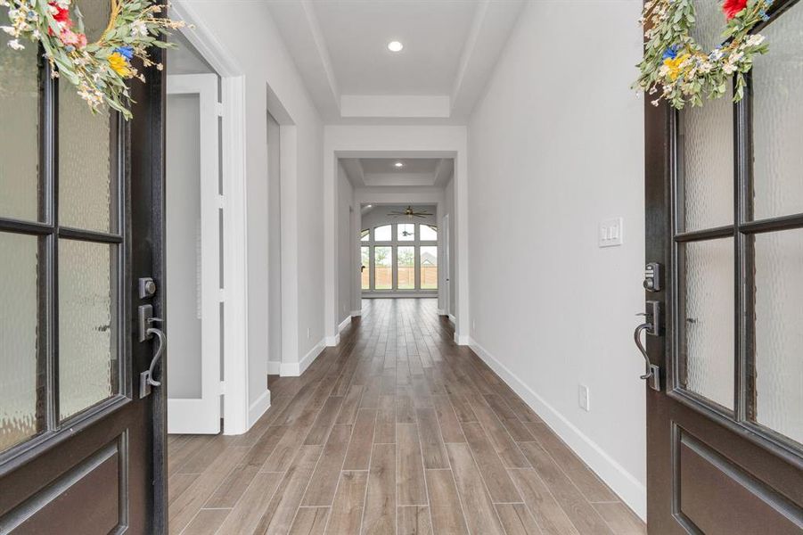 Welcome home! Double doors lead to a grand entrance with 12 ft ceilings!