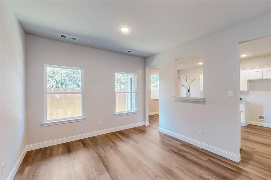 Spare room featuring light hardwood / wood-style flooring