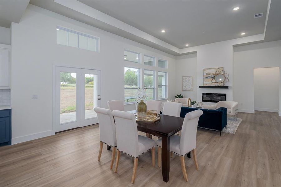 Dining area featuring light wood flooring