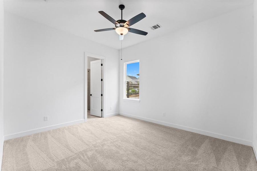 Secondary bedroom on first floor with ensuite bathroom.