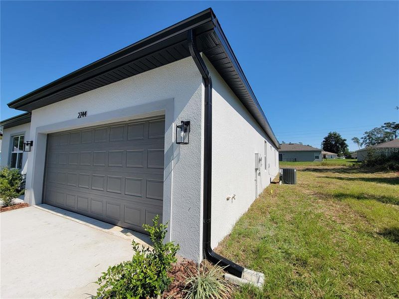 RAIN GUTTERS IN THE FRONT OF HOME