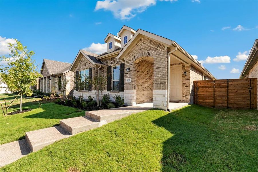 View of front of home with a front yard