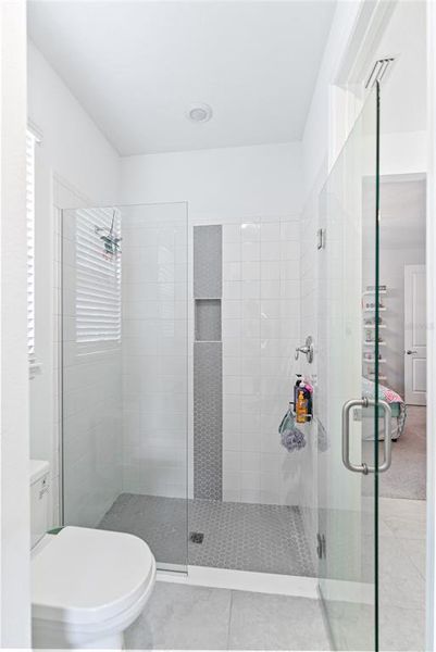 Frameless Glass Shower in the Jack n Jill Bathroom