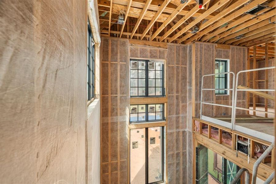 With double height ceilings and tons of windows, there's plenty of light!