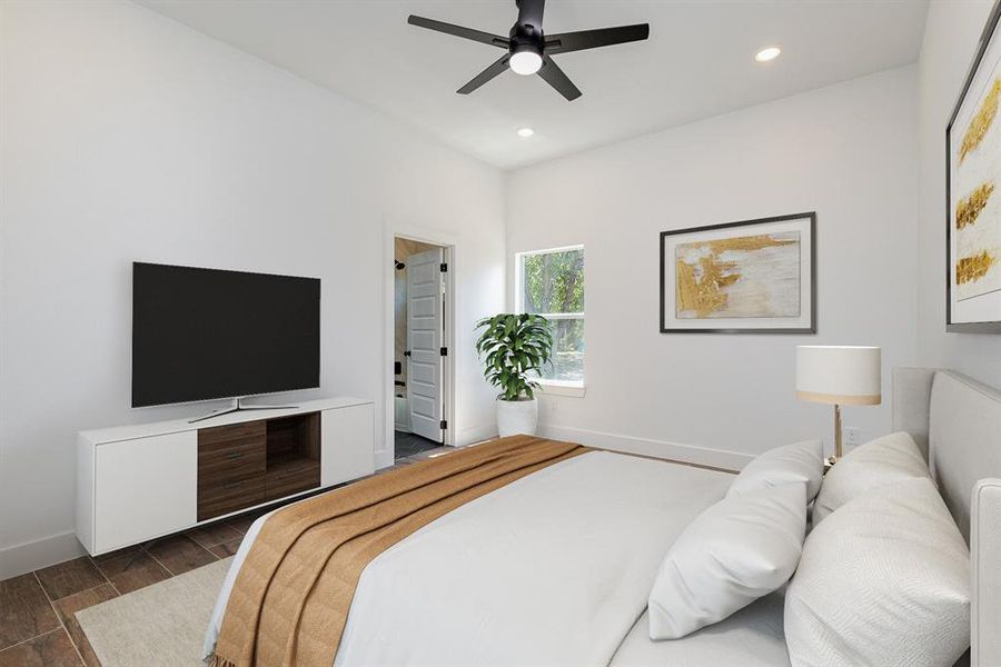 Bedroom featuring ceiling fan and dark hardwood / wood-style flooring