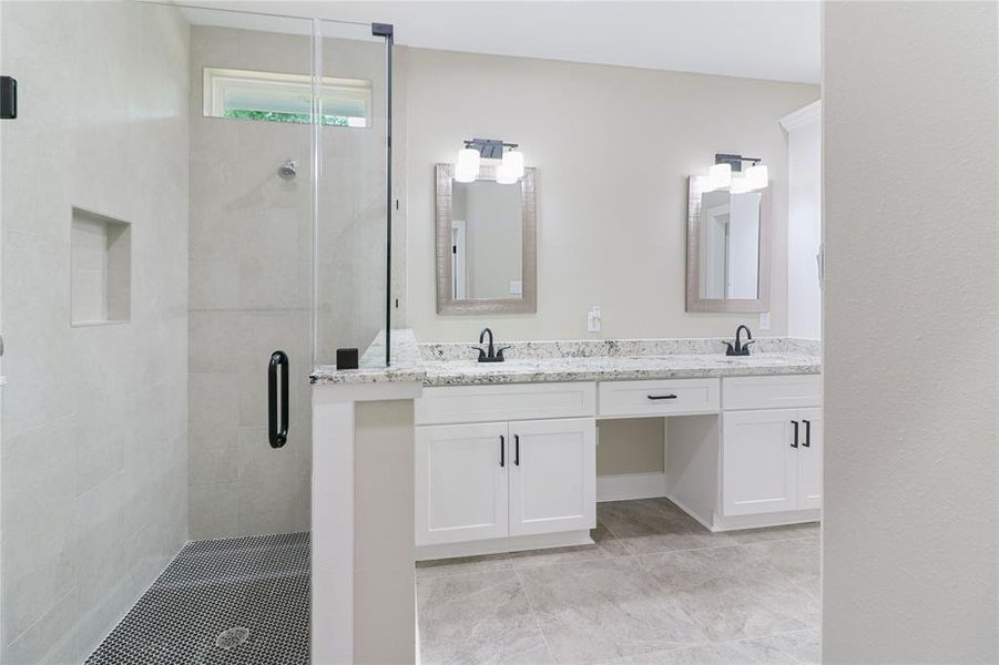 Over sized Walk in Shower with custom tile, soap shelf, & glass surround