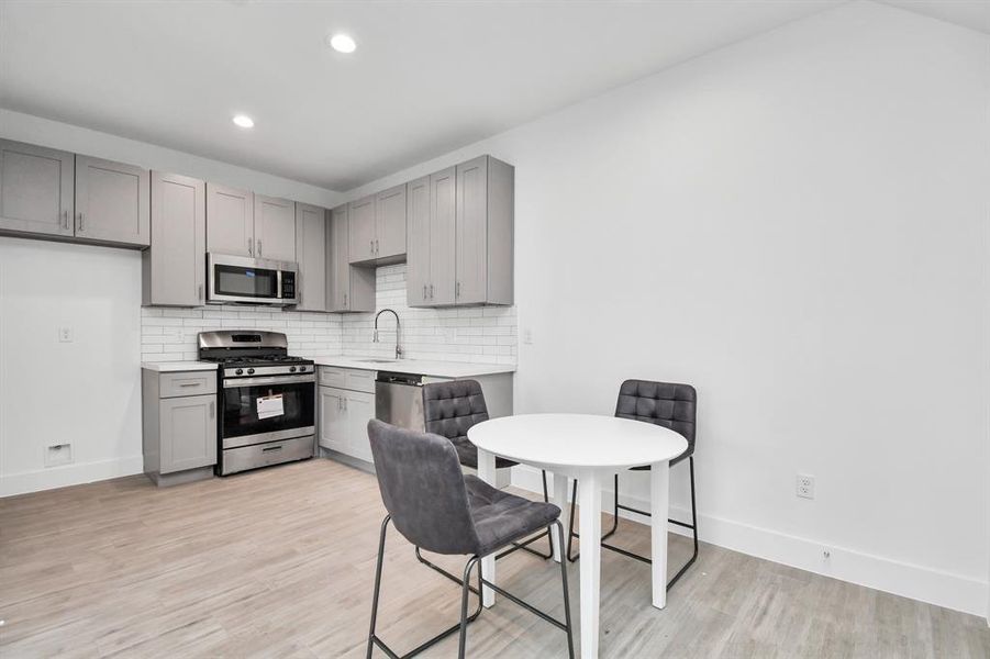 Kitchen offers plenty of storage space.