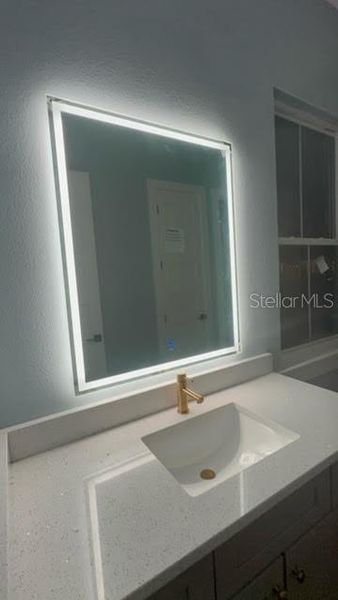 Lighted Mirror In Bathroom