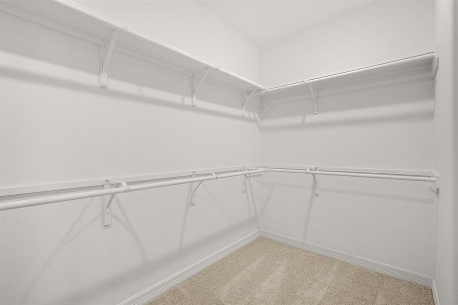 A view of your large primary walk-in Closet